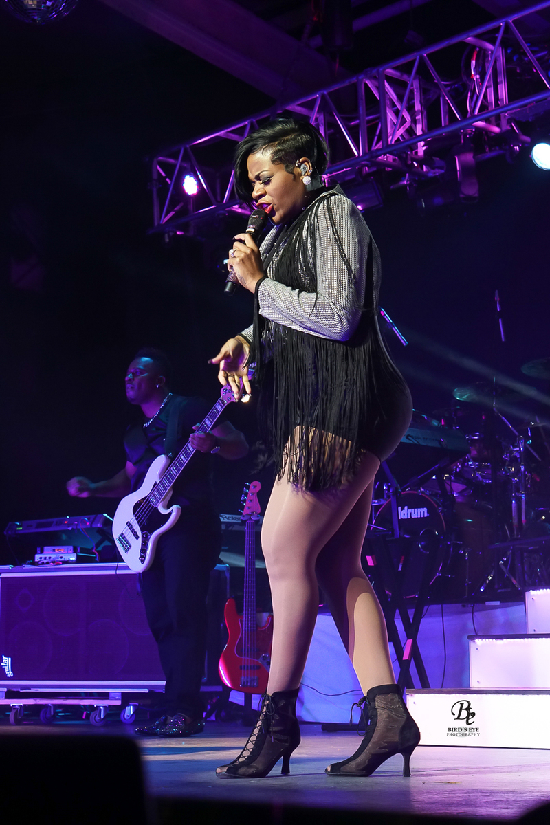 Fantasia singing on stage in concert in Baltimore