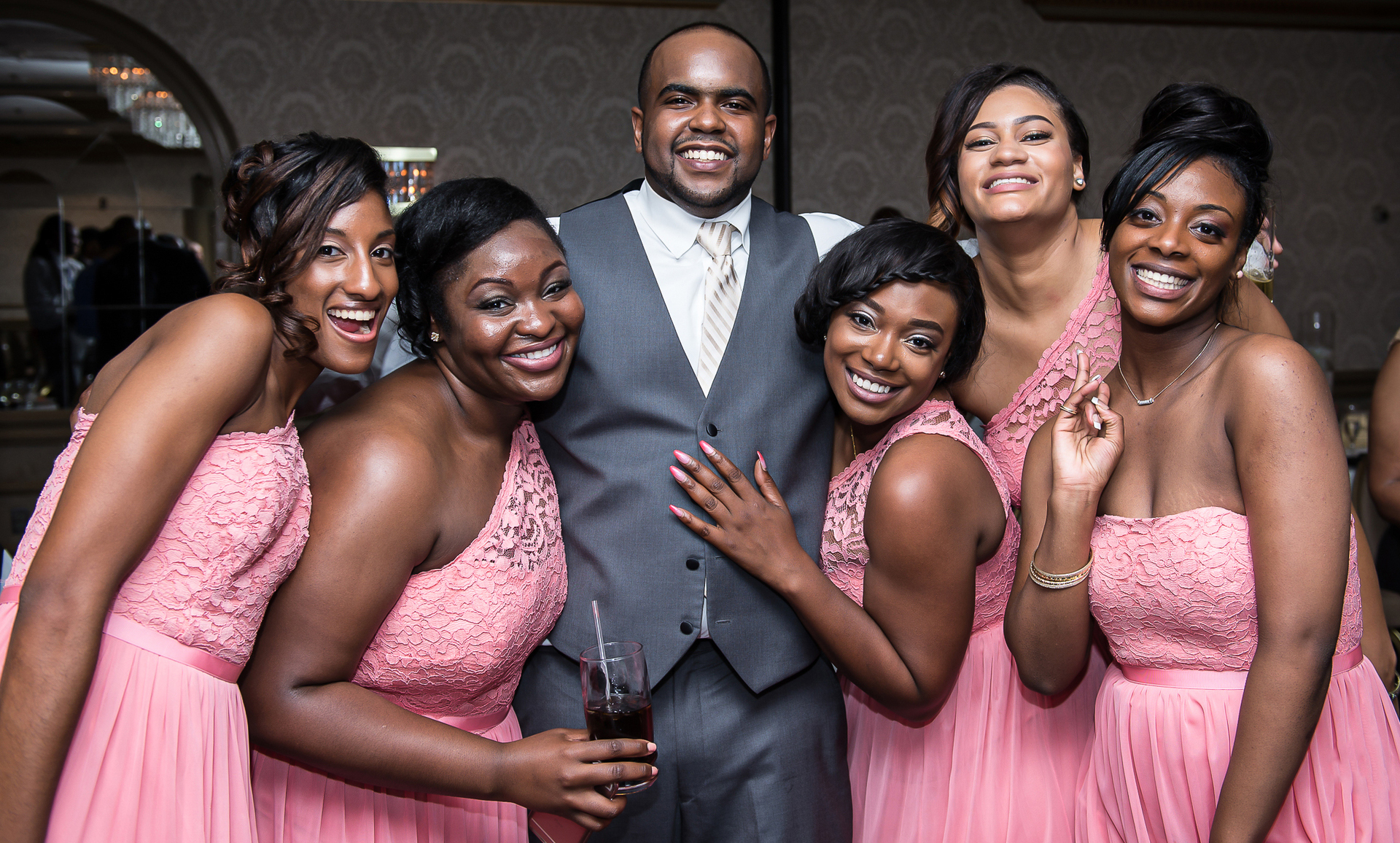 groom with bridesmaids